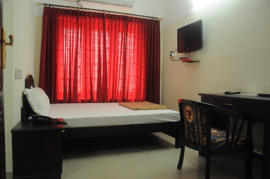Dreamz Hotel Thiruvananthapuram Zimmer foto