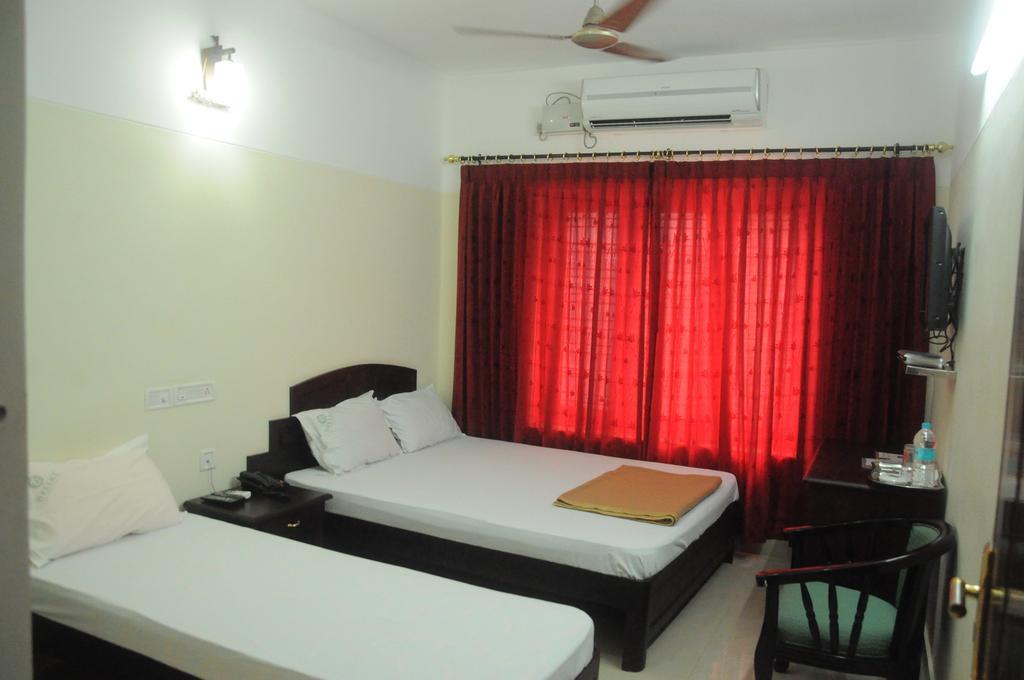 Dreamz Hotel Thiruvananthapuram Zimmer foto
